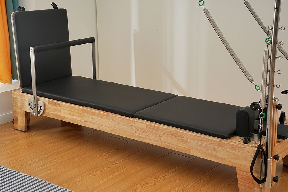 Pilatos Reformer com toalha