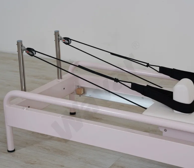Novo reformador de pilates de aço rosa com barra de pé embutida