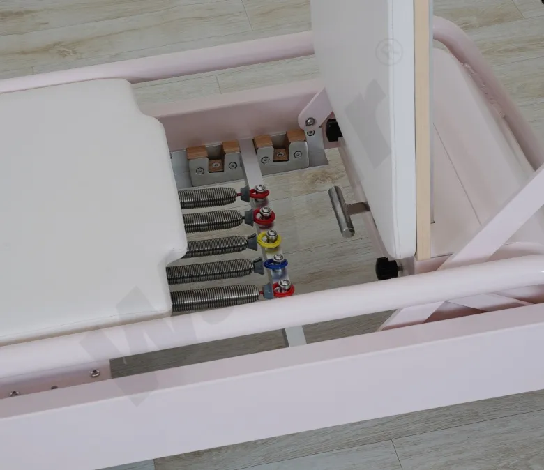 Novo reformador de pilates de aço rosa com barra de pé embutida