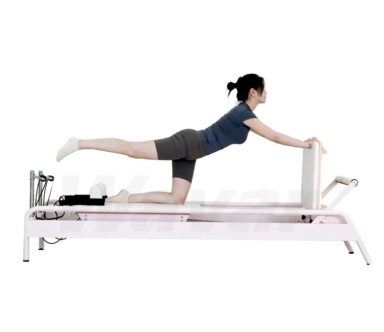 Novo reformador de pilates de aço rosa com barra de pé embutida