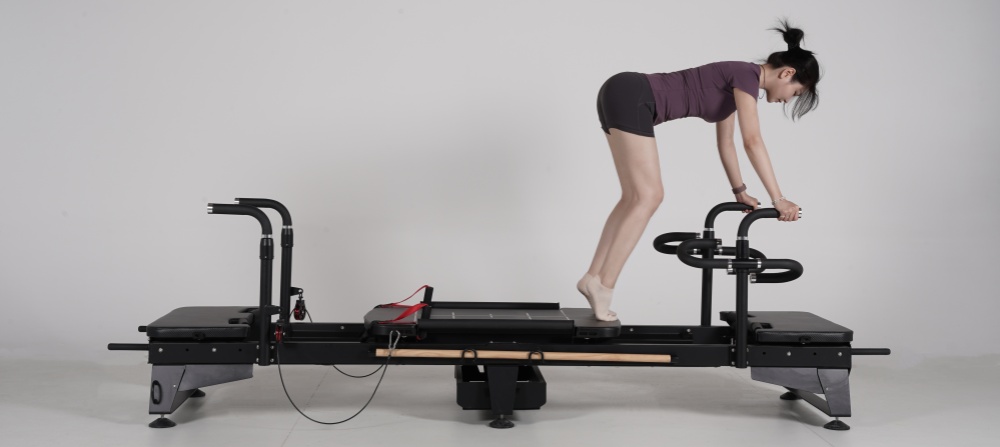 Máquina de reformador Pilates com alças rotativas